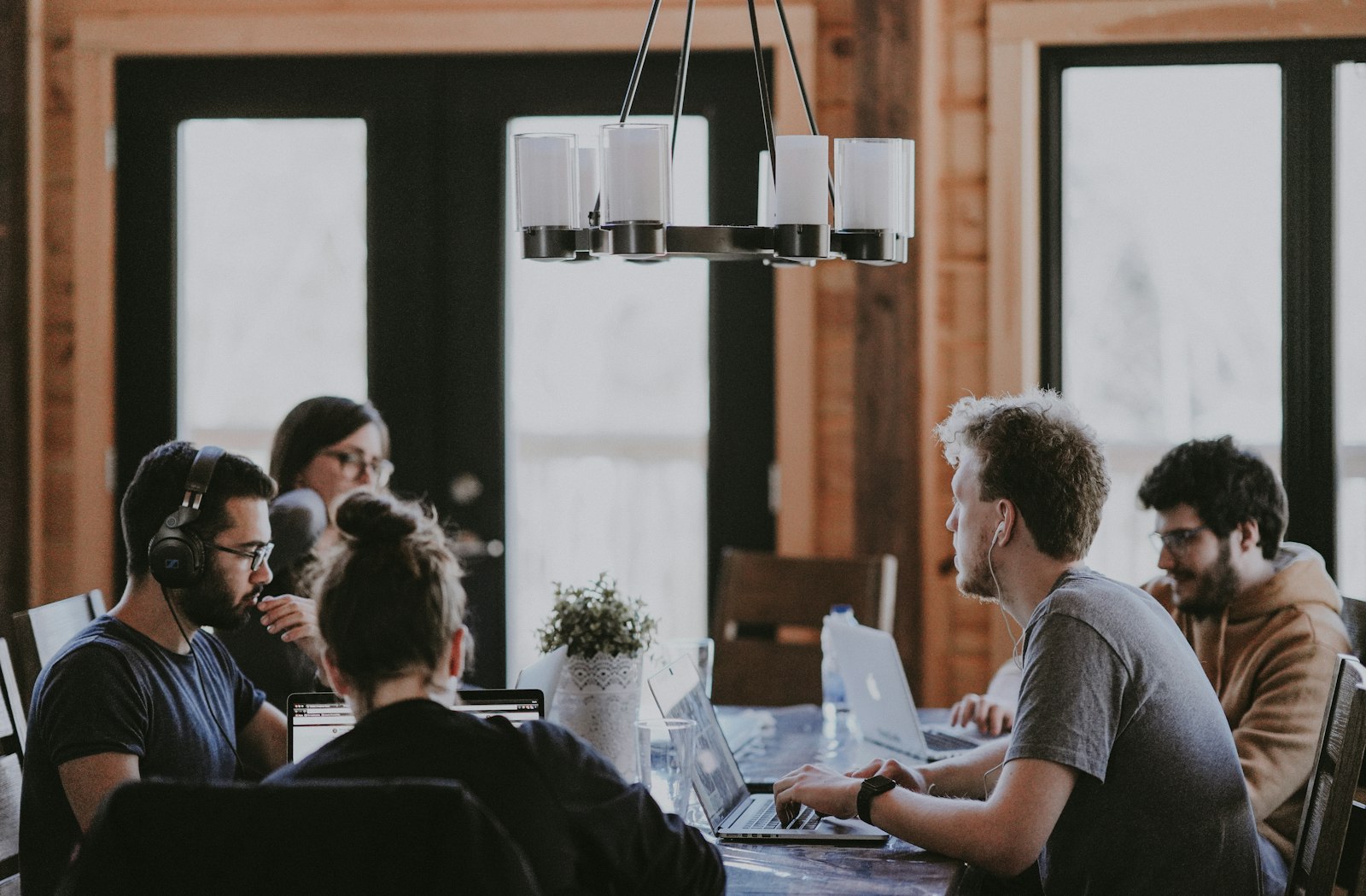 A team collaborating around a table during a working session